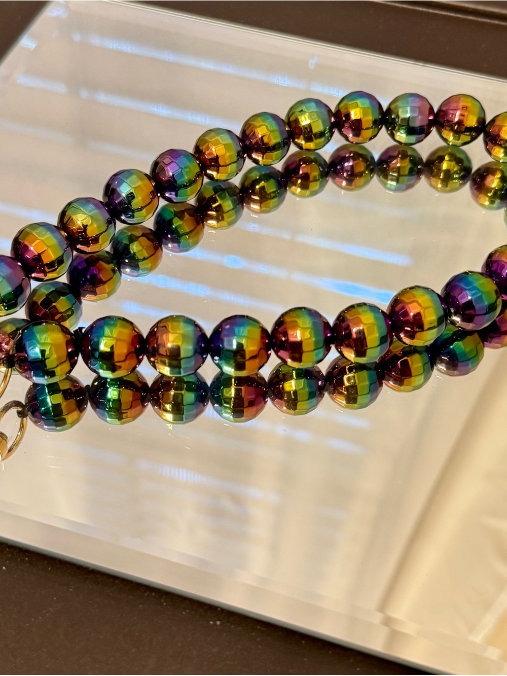 Shop Olimpias Creation Oil Slick Disco Pearls